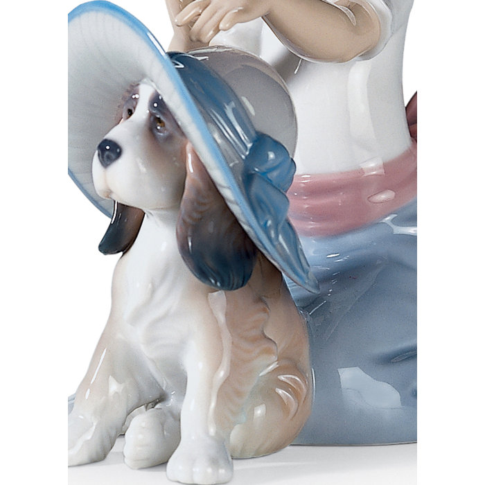 Glossy Porcelain Girl and Dog Figurine with Blue and Red Accents