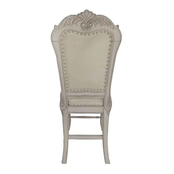 Ivory Faux Leather Upholstered Side Chair with Carved Wood Frame
