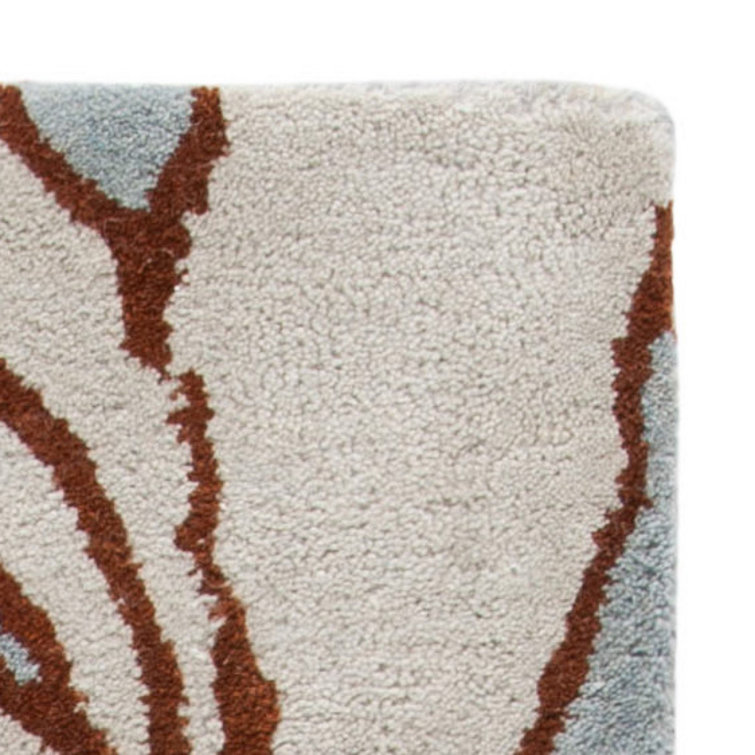 Handmade Blue and Multi Wool Tufted Area Rug