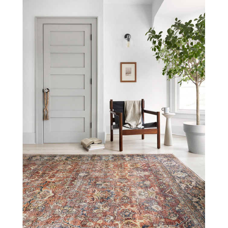 Terracotta and Blue Geometric Synthetic 9' x 12' Area Rug