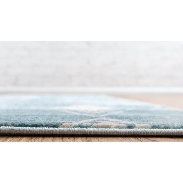 Turquoise and Ivory Rectangular Synthetic Indoor Rug, 5' x 8'