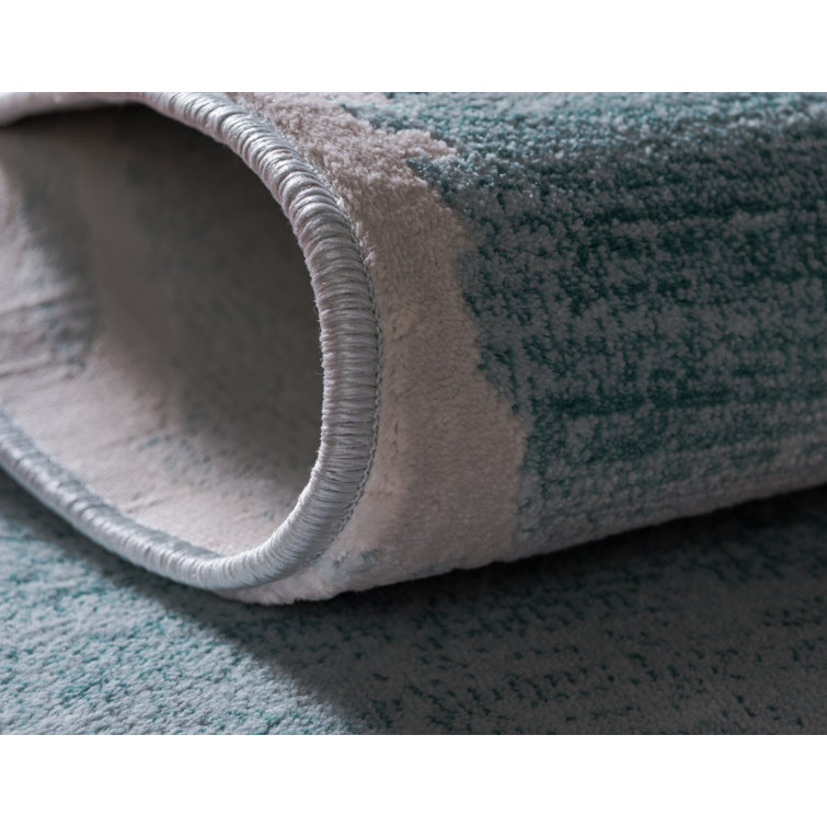 Turquoise and Ivory Rectangular Synthetic Indoor Rug, 5' x 8'