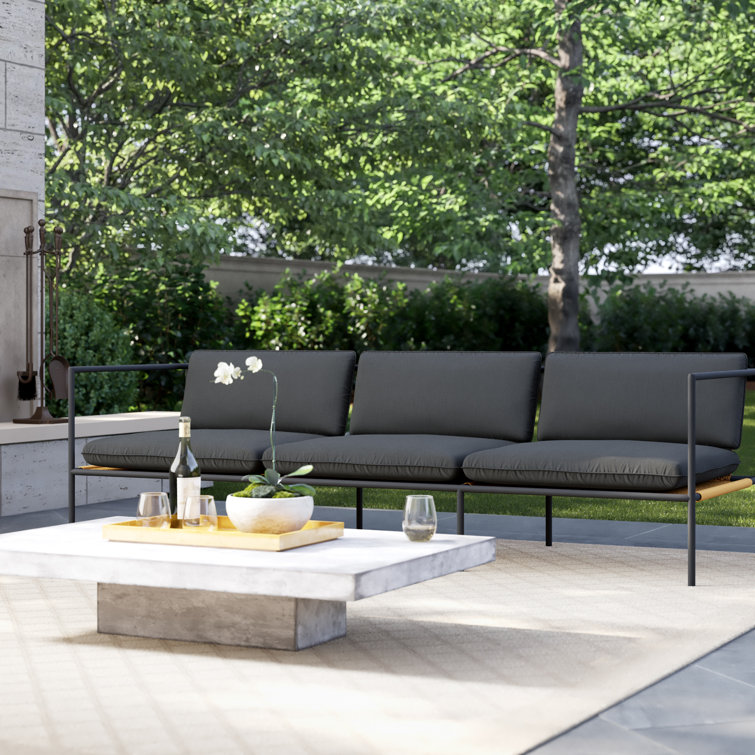 White Wicker and Plastic Outdoor 3-Seat Sofa with Blush Cushions