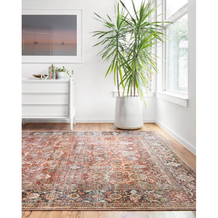 Terracotta and Blue Geometric Synthetic 9' x 12' Area Rug