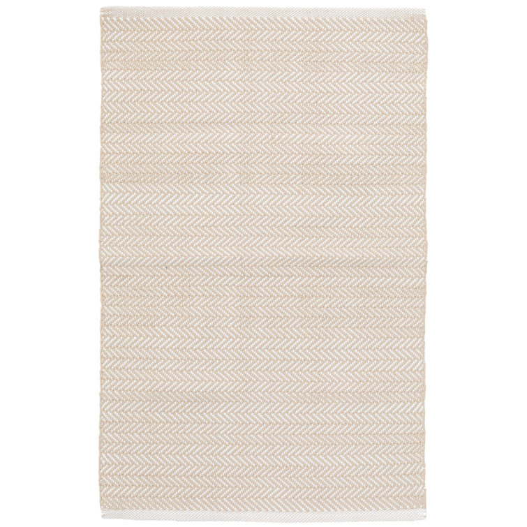 Ivory and Beige Herringbone Synthetic 10' x 14' Rug