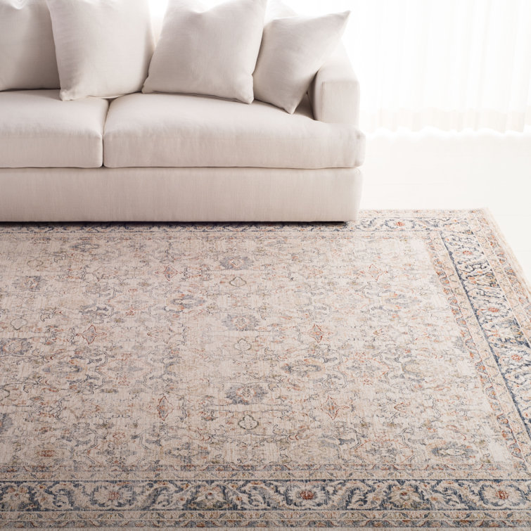 Ivory Elegance 5'3" x 7'6" Synthetic Hand-Knotted Area Rug