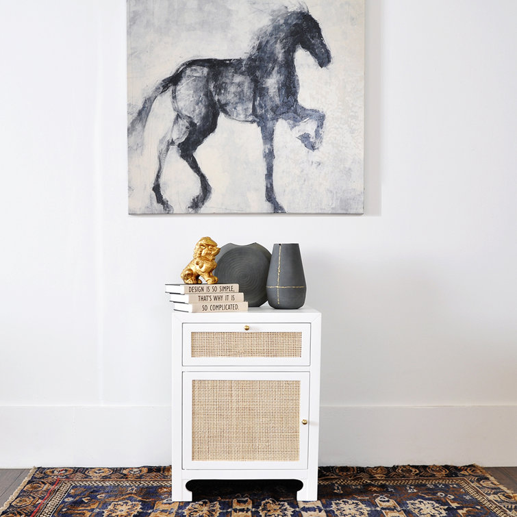 Elegant Freestanding White Cabinet with Adjustable Shelving and Brass Accents