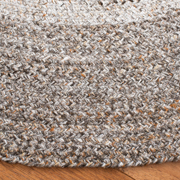 Handmade Gray Braided Round Synthetic Area Rug, 4' x 4'