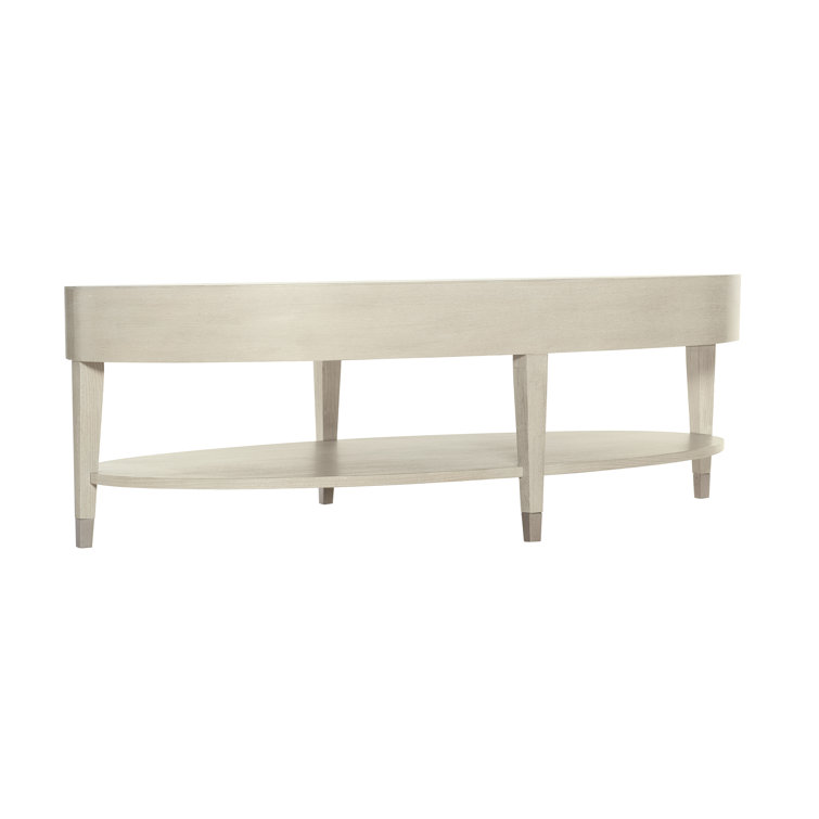 Transitional Cream Oval Coffee Table with Metal Accents and Storage