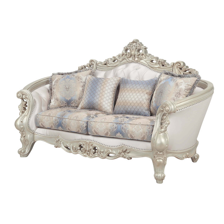 Elegant Floral Tufted Fabric Loveseat with Rolled Arms and Nailhead Accents