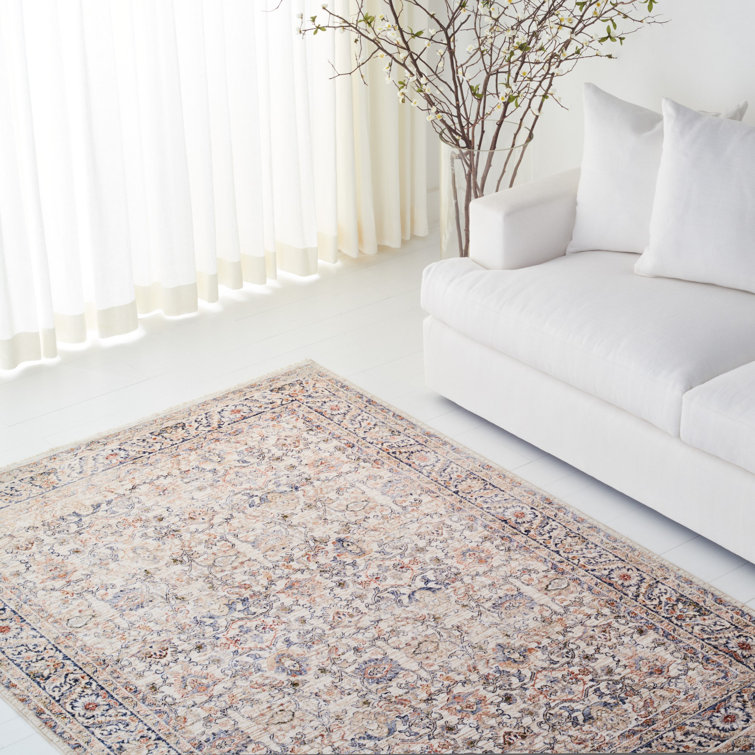 Ivory Elegance 5'3" x 7'6" Synthetic Hand-Knotted Area Rug