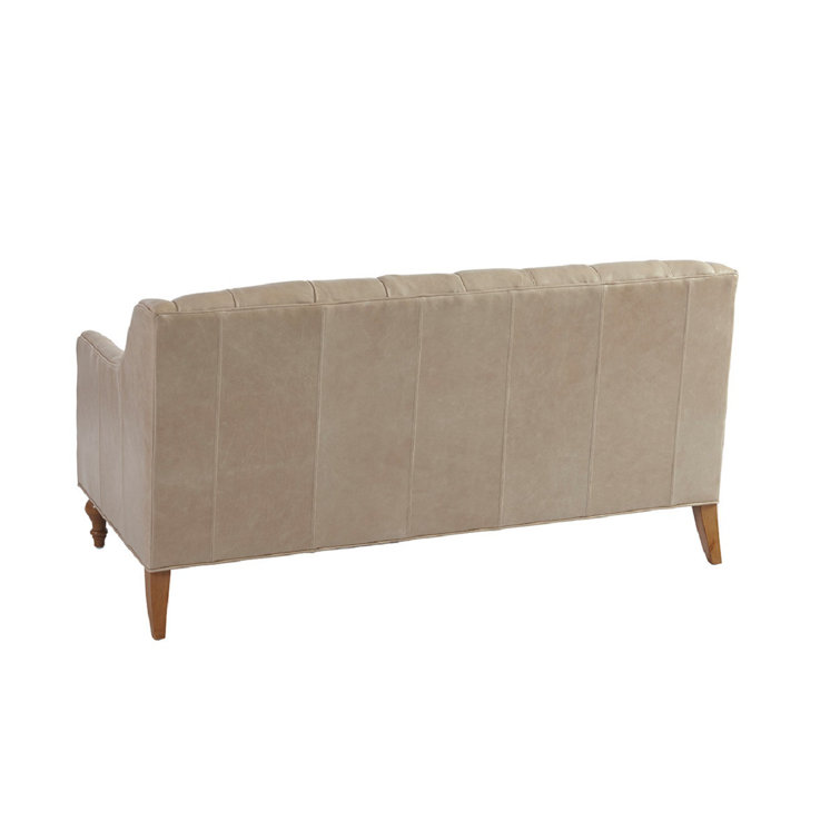 Elegant Sands Beige Leather Settee with Tufted Rolled Arms