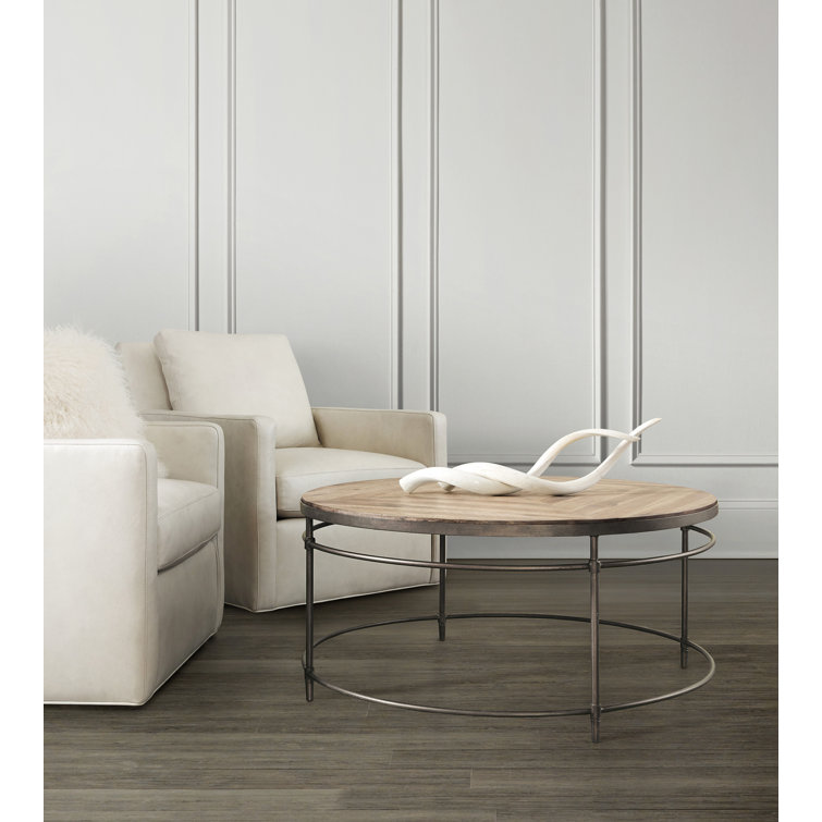 Transitional Round Cocktail Table with Storage in Black and Brown