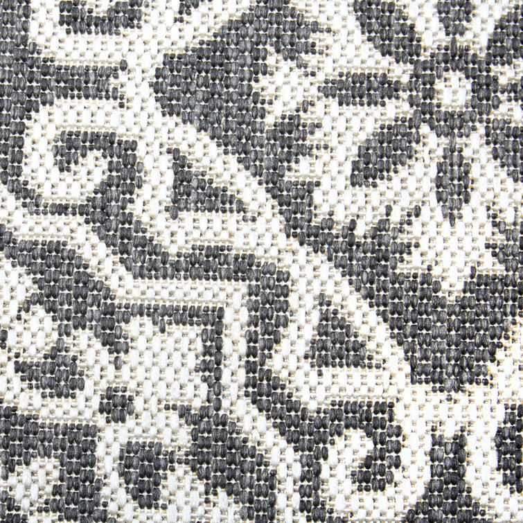 Danica 5'2" x 7'2" Black/Gray Synthetic Medallion Area Rug