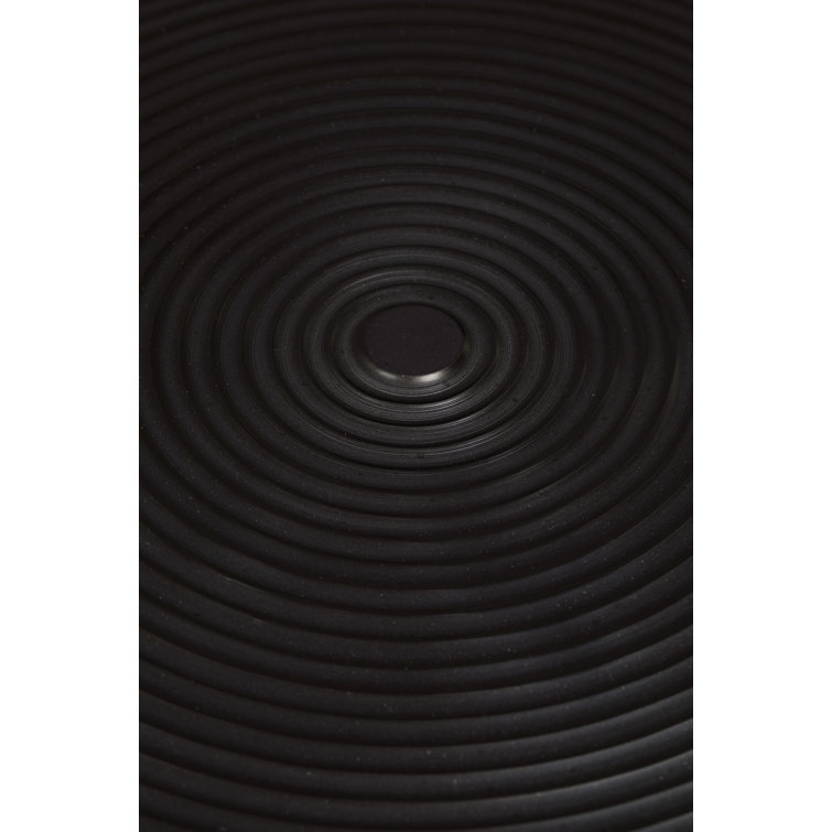 Hypnotising Black Round Metal Dining Table