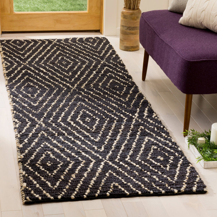 Hand-Knotted Black and Ivory Wool Area Rug