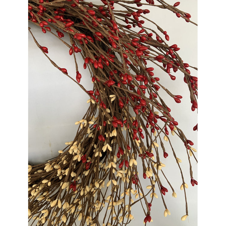 22'' Handcrafted Faux Grapevine Wreath with Blue, Red, and White Berries