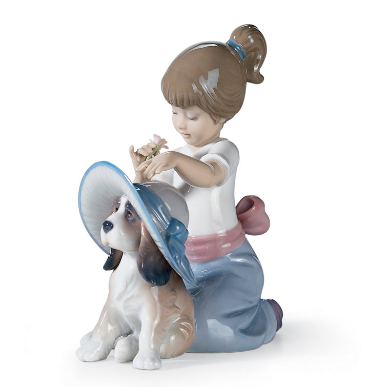 Glossy Porcelain Girl and Dog Figurine with Blue and Red Accents