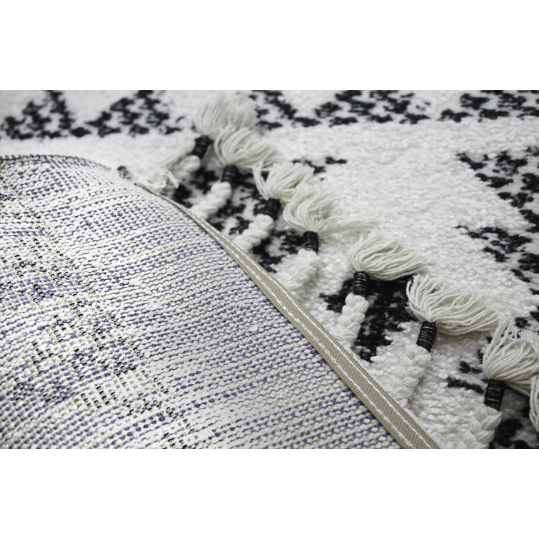 Handmade Geometric Black Synthetic 8' x 10' Stain-Resistant Rug