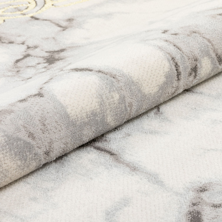 Ivory Abstract Easy-Care Stain-Resistant Synthetic Area Rug 5' x 7'