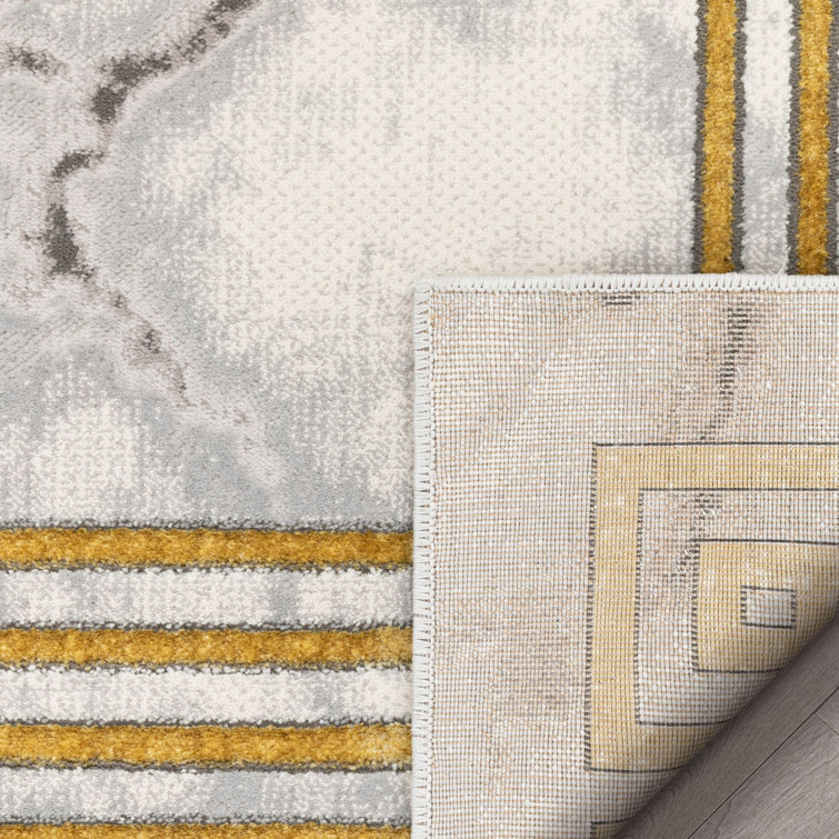 Ivory Abstract Easy-Care Stain-Resistant Synthetic Area Rug 5' x 7'