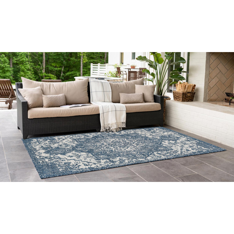 Blue and Ivory Stain-Resistant Synthetic Outdoor Rug, 4' x 6'