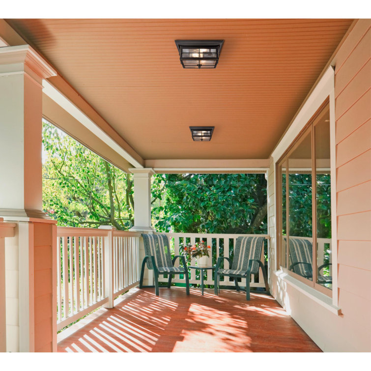 Orwell Matte Black and Bronze 11" Outdoor Flush Mount with Clear Seeded Glass