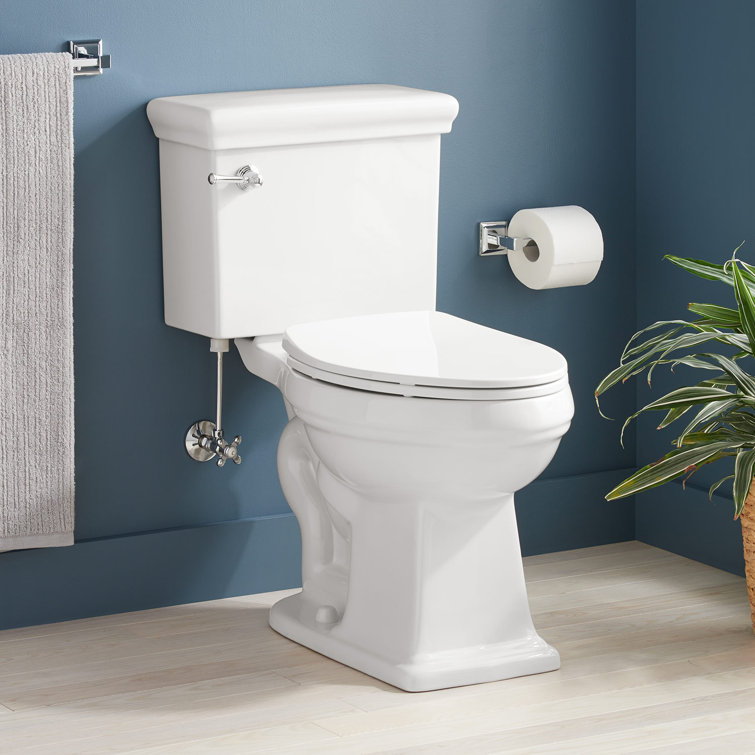 Key West White Two-Piece Elongated Toilet with Chrome Flush Lever