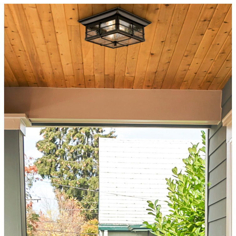 Orwell Matte Black and Bronze 11" Outdoor Flush Mount with Clear Seeded Glass