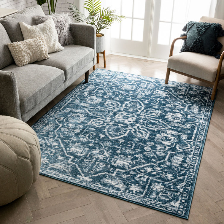 Light Blue Floral Synthetic Reversible 5' x 7' Rug