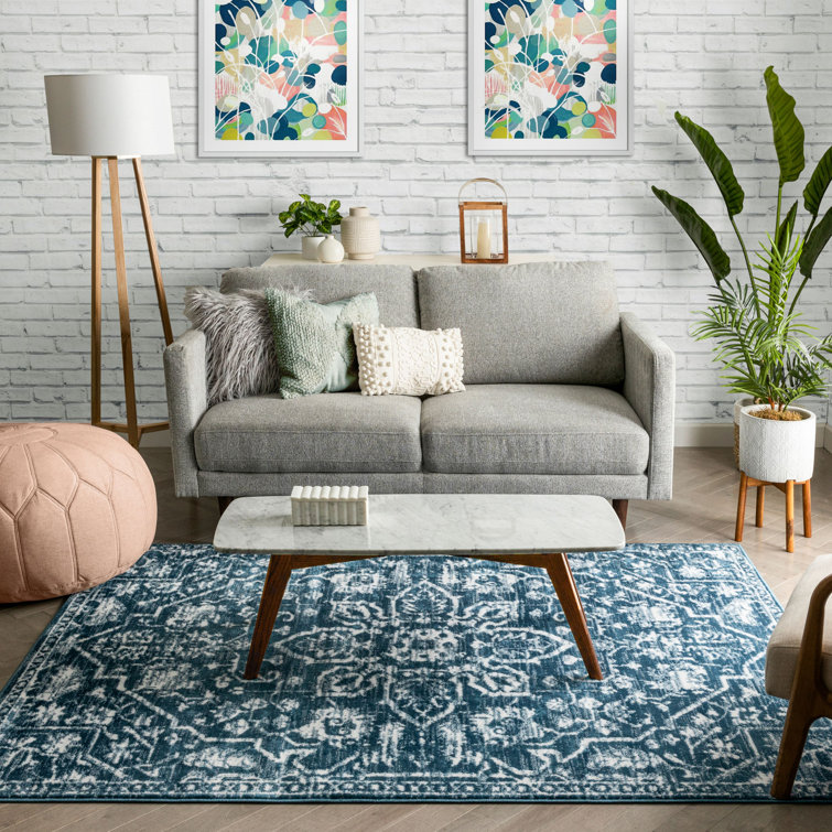 Light Blue Floral Synthetic Reversible 5' x 7' Rug