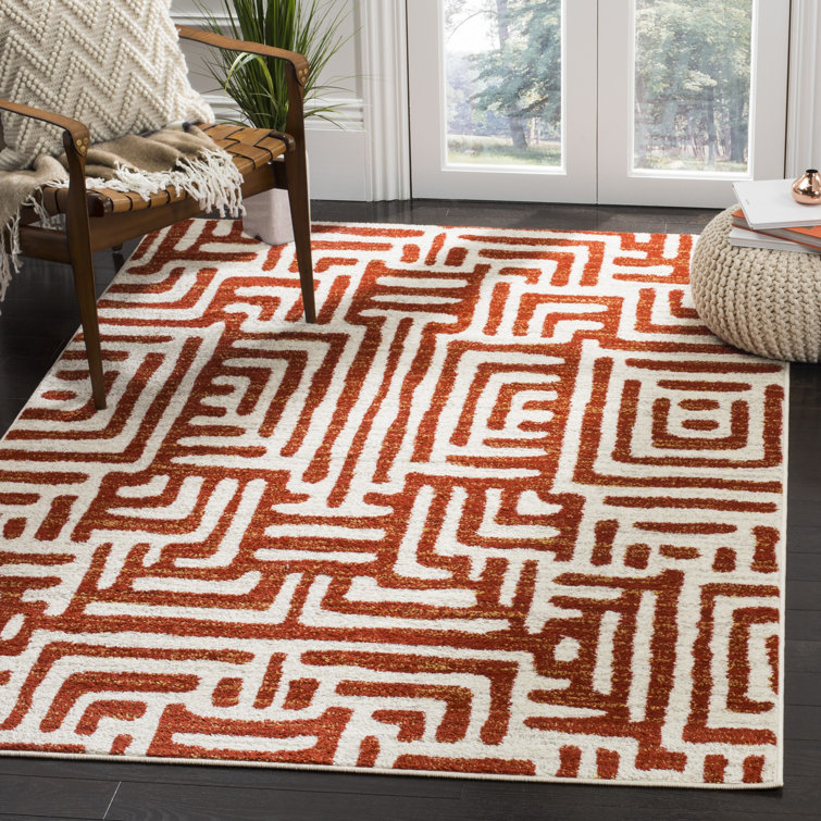 Ivory and Terracotta Geometric Synthetic 4' x 6' Area Rug