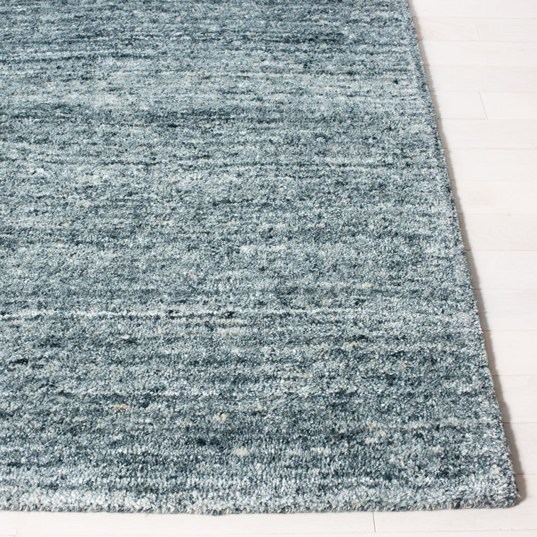 Handmade Himalaya Tufted Blue Wool Rectangular Rug - 5' x 8'