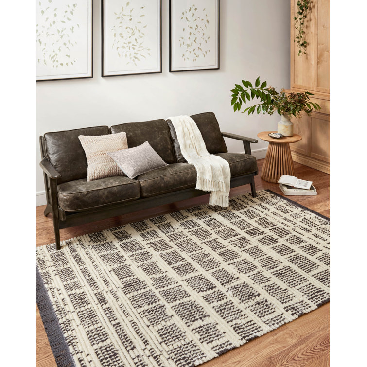 Ivory and Charcoal Synthetic Easy-Care Area Rug, 62" x 90"