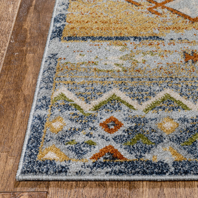 Cream and Red Synthetic Tribal Rectangular Rug