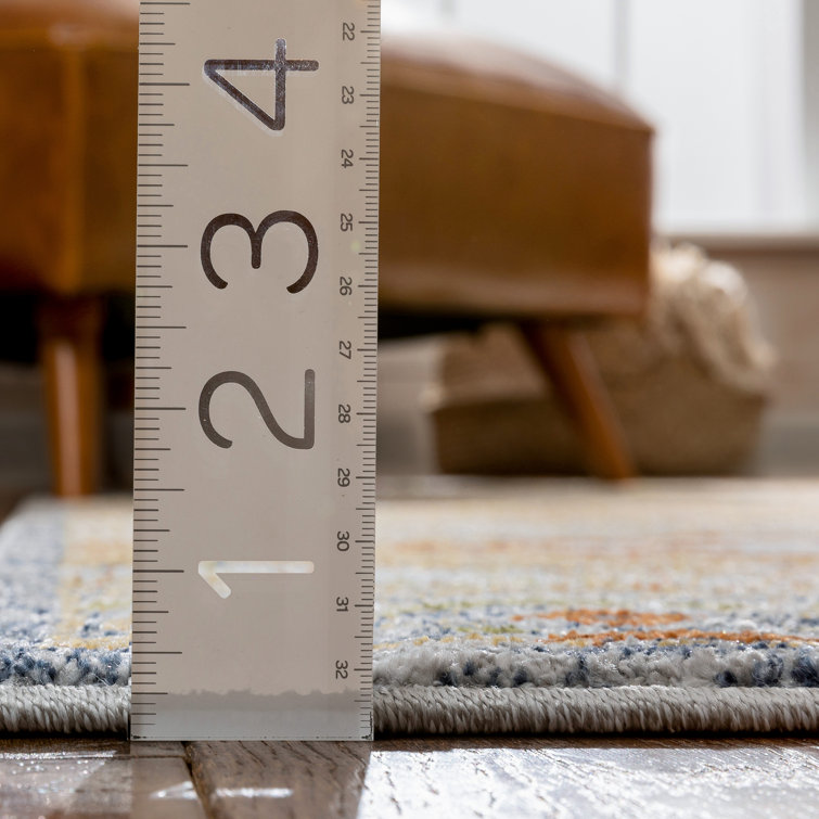 Cream and Red Synthetic Tribal Rectangular Rug