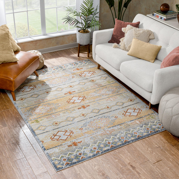 Cream and Red Synthetic Tribal Rectangular Rug