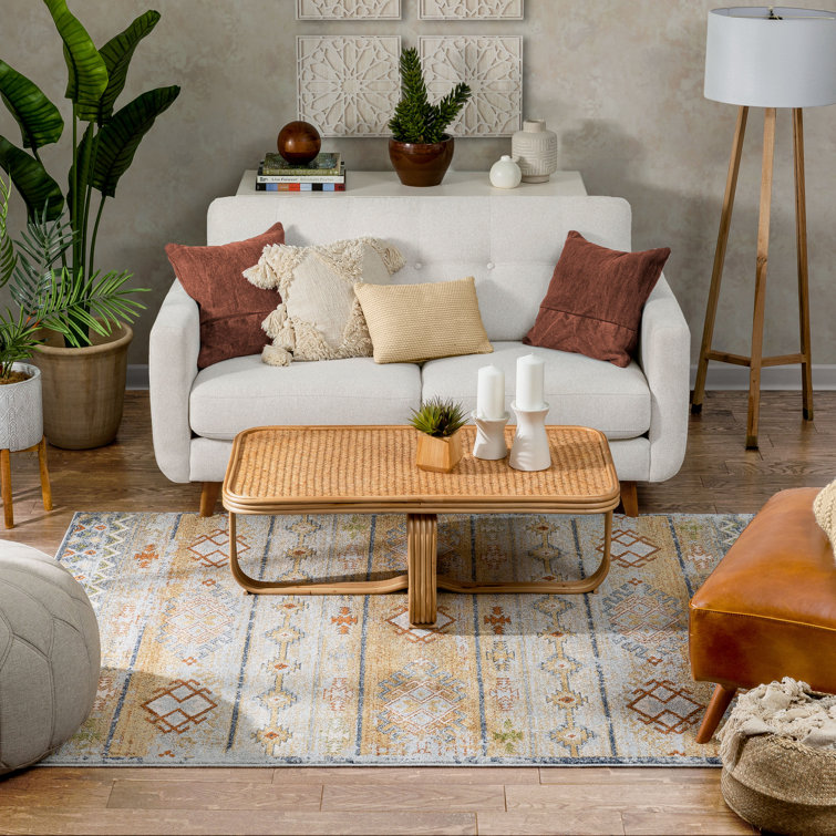 Cream and Red Synthetic Tribal Rectangular Rug