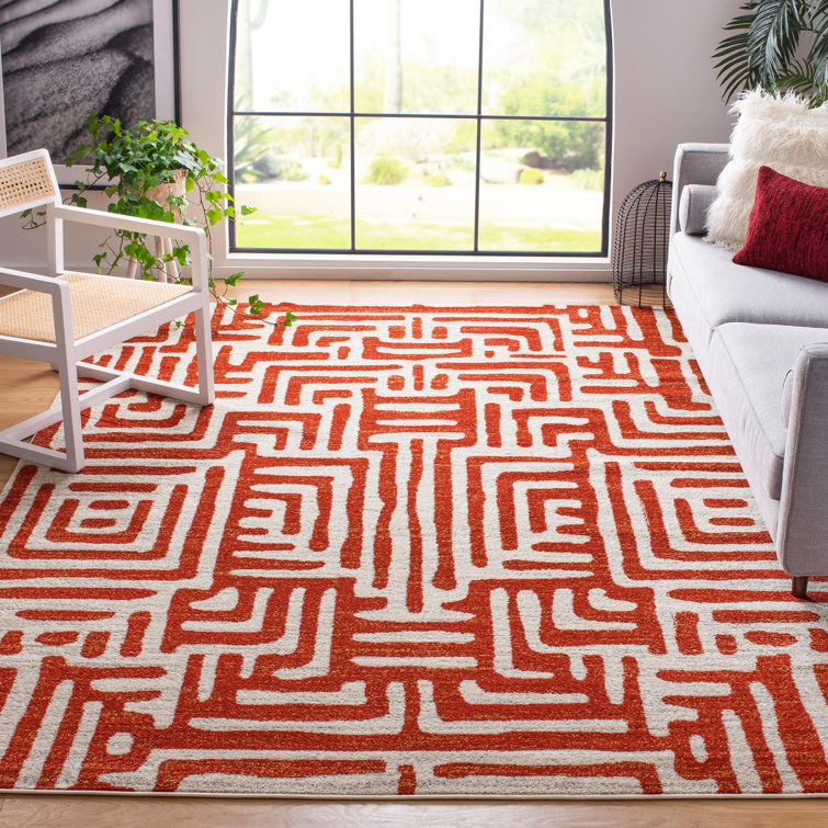 Ivory and Terracotta Geometric Synthetic 4' x 6' Area Rug