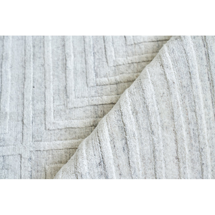 Ivory Geometric Handmade Wool and Viscose Rug, 8' x 10'