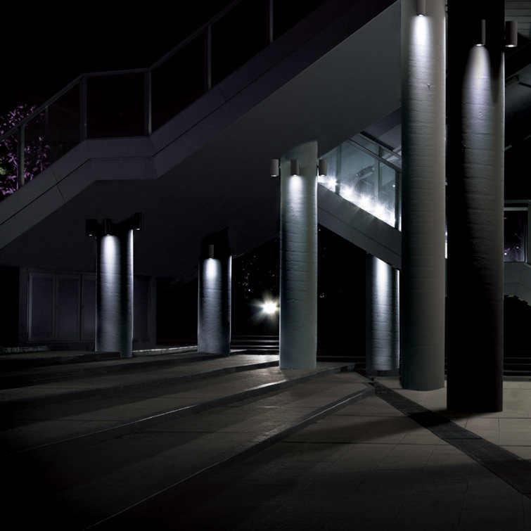 Sleek Minimalist Bronze Cylinder LED Outdoor Wall Sconce