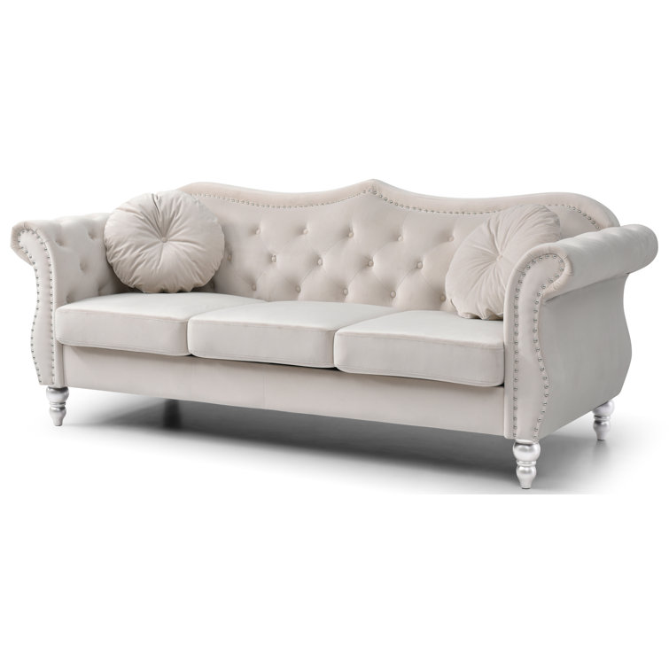 Ivory Tufted Velvet Sofa with Nailhead Trim and Wood Legs