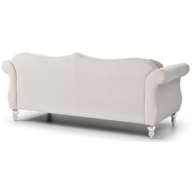 Ivory Tufted Velvet Sofa with Nailhead Trim and Wood Legs