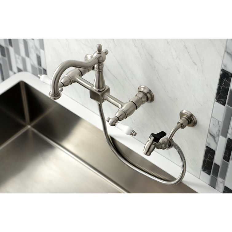 Heritage Brushed Nickel Wall-Mount Kitchen Faucet with Brass Sprayer