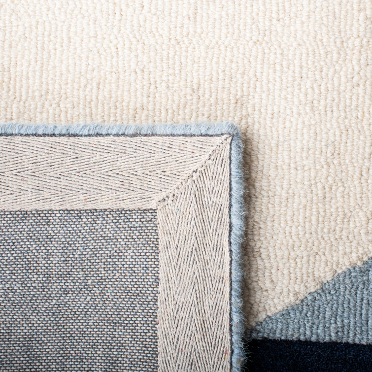 Ivory and Blue Abstract Wool 10' x 14' Rug