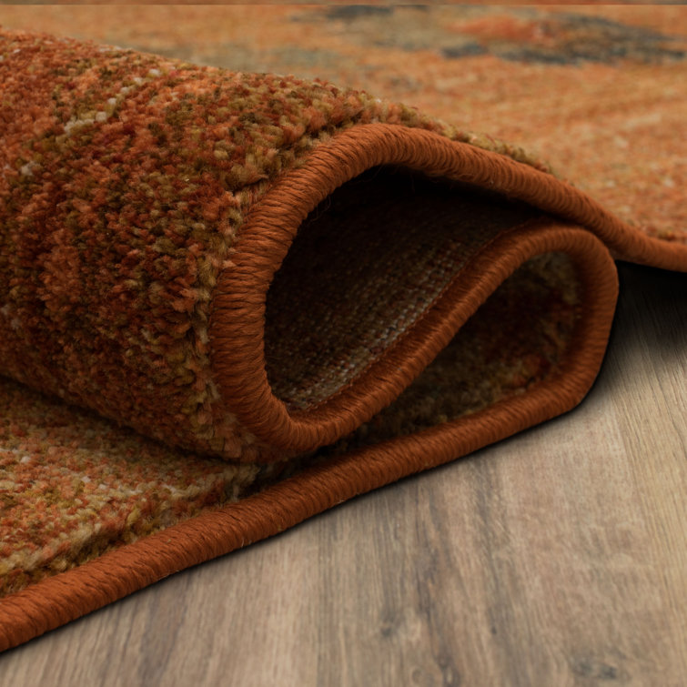 Saffron Orange and Turquoise Floral Synthetic Area Rug