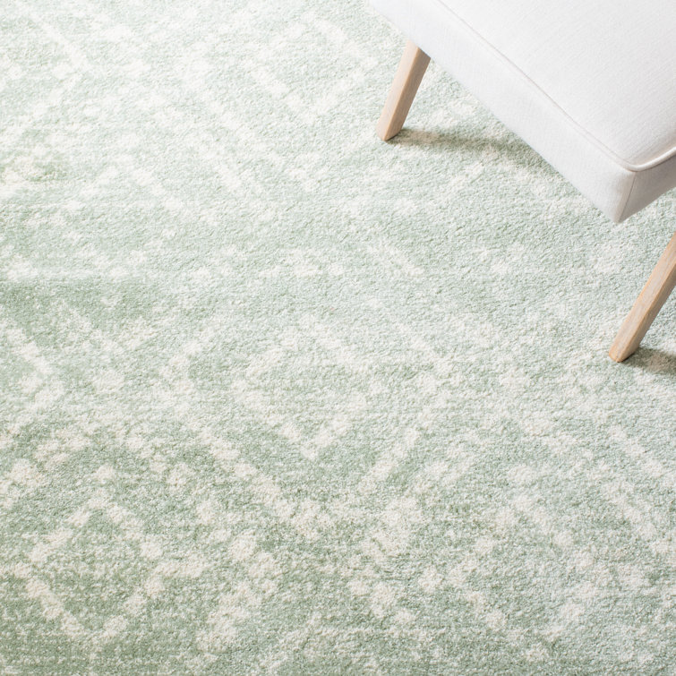 Green and Ivory Geometric Synthetic 4' x 6' Rectangular Rug
