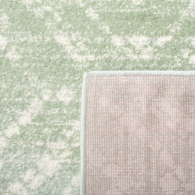 Green and Ivory Geometric Synthetic 4' x 6' Rectangular Rug
