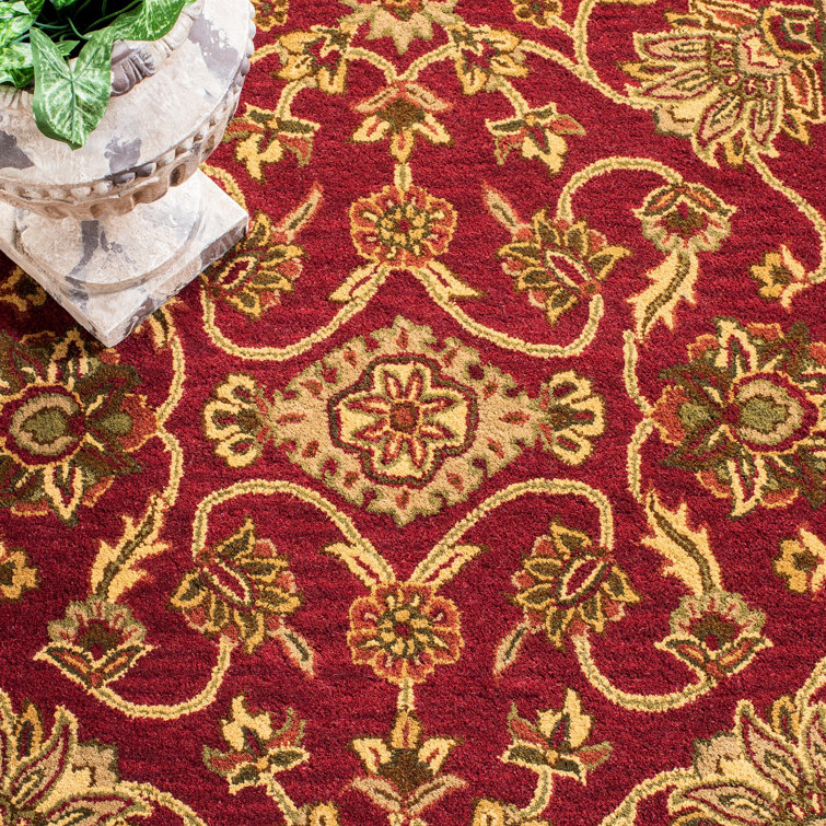 Handmade Round Burgundy and Gold Wool Area Rug
