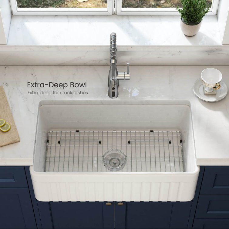 Elegant White Fireclay Farmhouse Kitchen Sink with Grid and Strainer